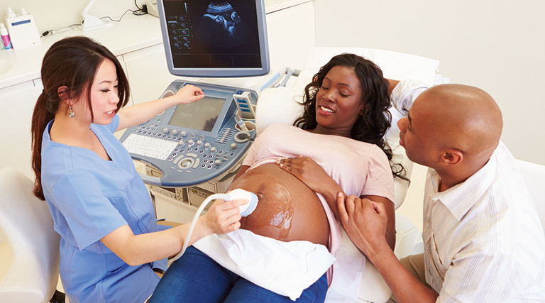 Black couple attends ultrasound appointment